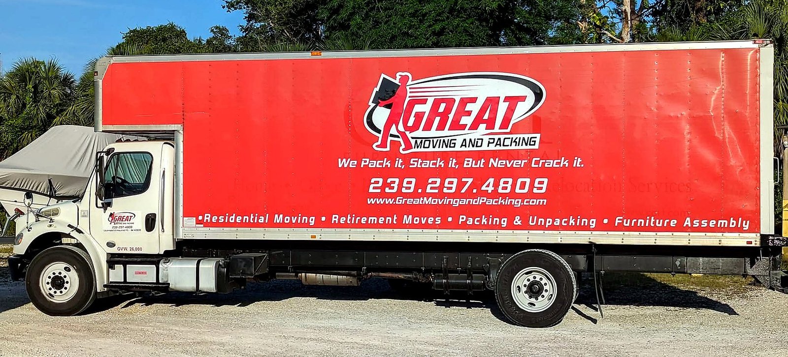 Great Moving & Packing truck wrap showing logo, phone number, and residential moving services